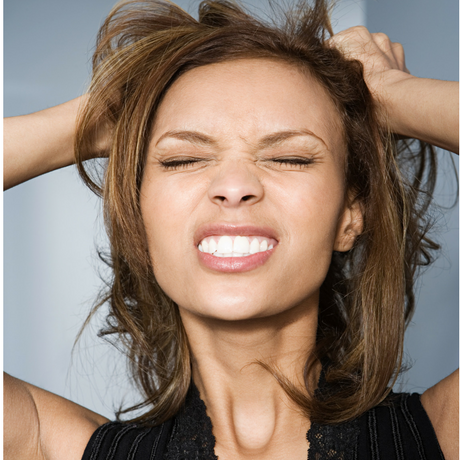 Business Woman Pulling her hair out